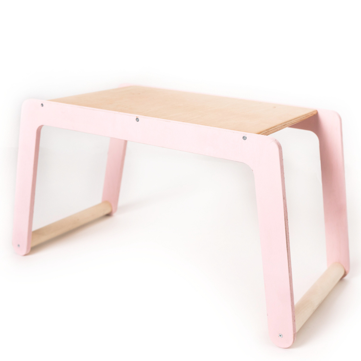 Small children's desk with pink legs and a natural wood tabletop, featuring a minimalist design.
